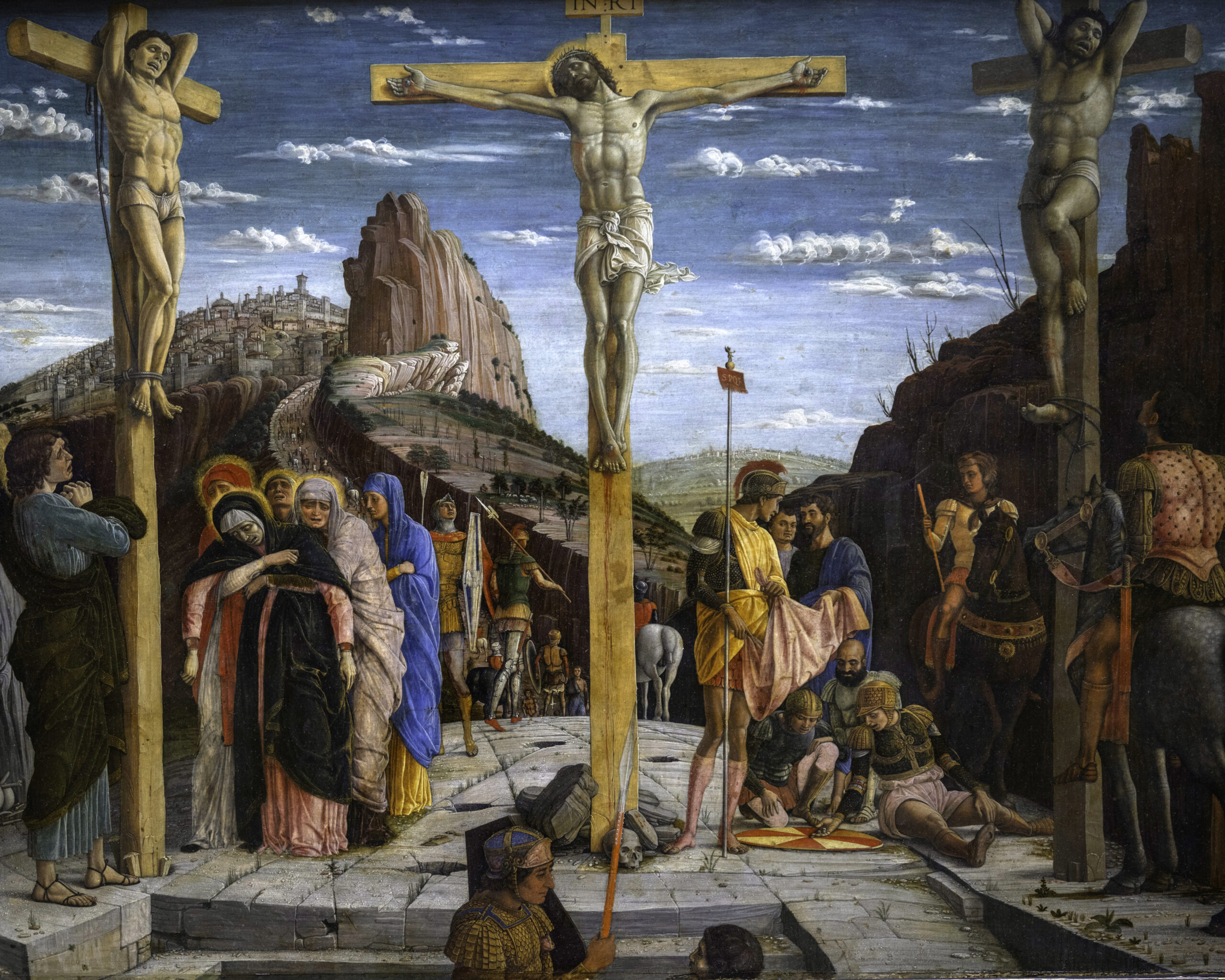 Crucifixion, Andrea Mantegna (1431–1506). 1460, oil on panel. Louvre, photographed by Wilfredo Hernandez / Wikimedia Commons