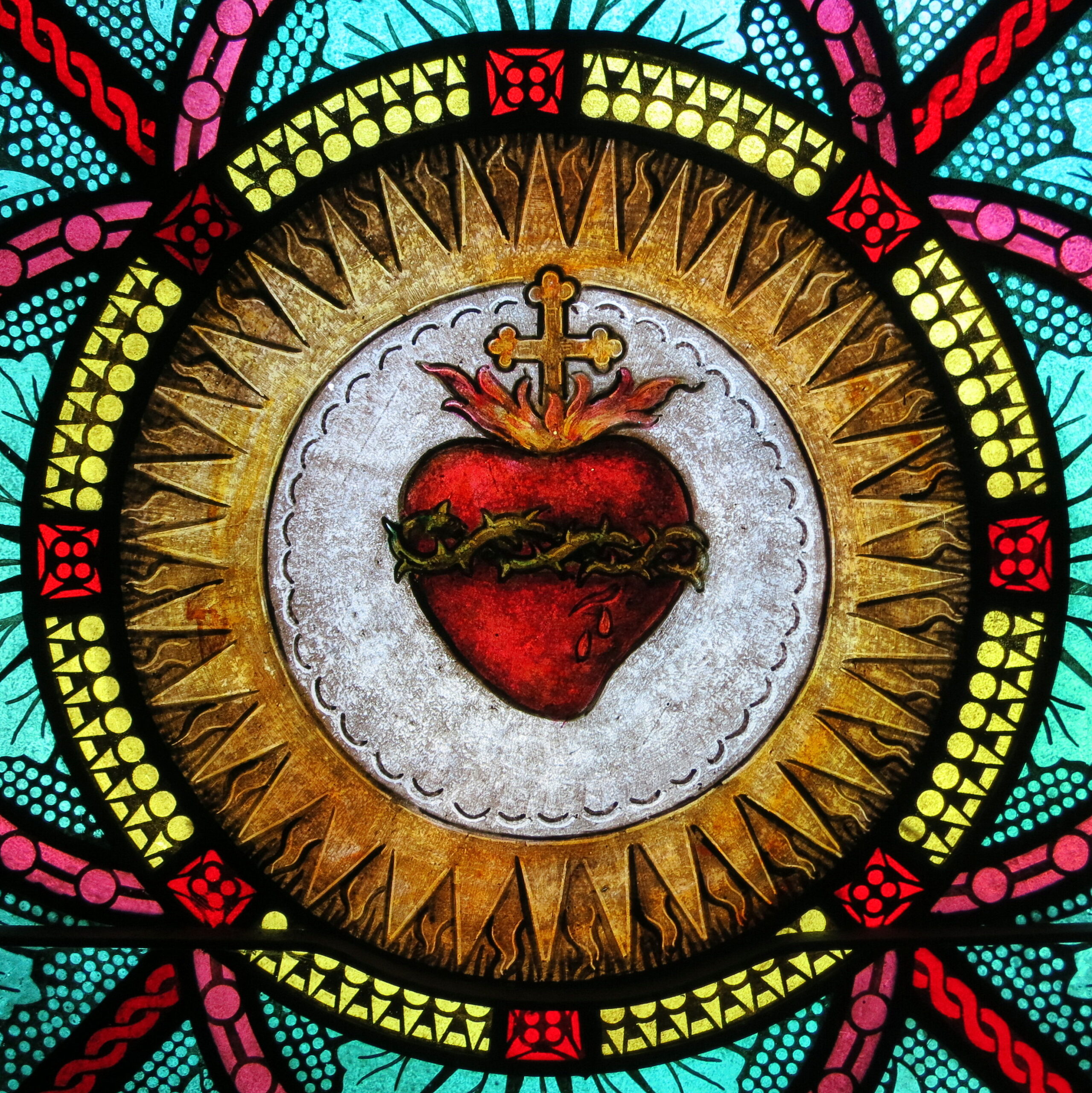 Sacred Heart of Jesus stained glass in All Saints Catholic Church, St. Peters, Missouri. Photographed by Nheyob / Wikimedia Commons