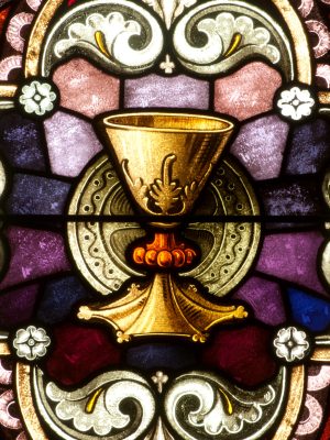 Stained,Glass,Window,Depicting,A,Golden,Chalice,And,Paten